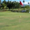 A view of a hole with water in background at Berwind Country Club